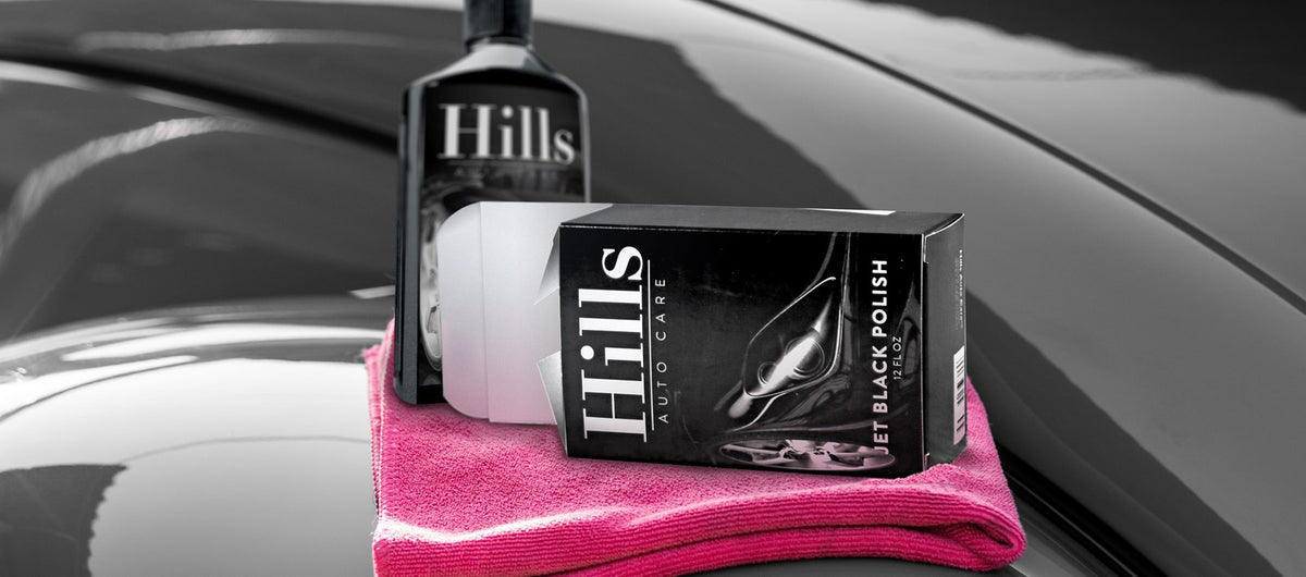 Custom printed auto care product box inside a vehicle
