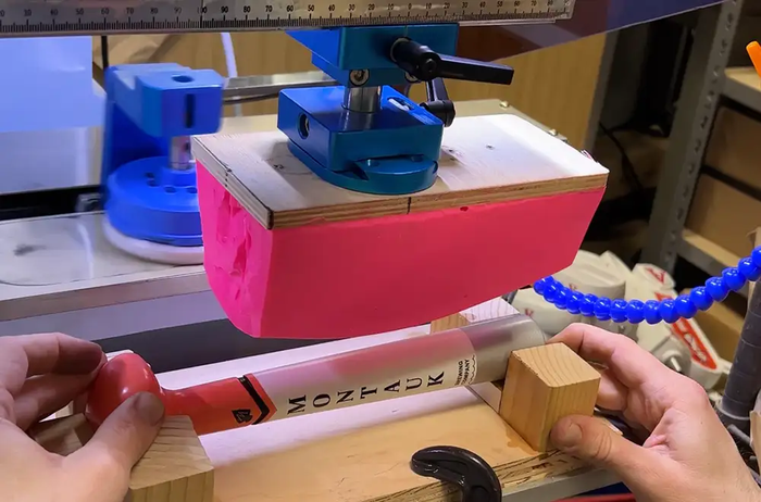 Pad printing a logo onto a part